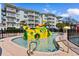 Community splash pad featuring a yellow submarine for with water features and seating at 14290 Ocean Hwy. # 407, Pawleys Island, SC 29585