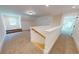 Spacious bonus room with carpet and a dormer window plus stairs at 1464 Hawthorn Dr., Pawleys Island, SC 29585