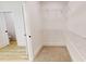 Walk-in closet with wood-style flooring and wire shelving for optimal organization at 1464 Hawthorn Dr., Pawleys Island, SC 29585