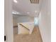 Upstairs hallway featuring neutral carpet and white accents, leading to additional rooms at 1464 Hawthorn Dr., Pawleys Island, SC 29585