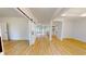Open-concept living space with modern flooring, white walls, and sliding barn door at 1464 Hawthorn Dr., Pawleys Island, SC 29585