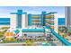 Bright, airy hotel exterior near the beach with an attached covered parking area and walkway at 1501 S Ocean Blvd. # 639, Myrtle Beach, SC 29577