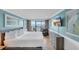 Airy bedroom with tiled floors, ocean view, and beach themed art at 1501 S Ocean Blvd. # 639, Myrtle Beach, SC 29577