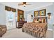 Comfortable bedroom featuring a bed, dresser, and tropical decor creating a relaxing and inviting space at 1510 North Shore Dr, Sunset Beach, NC 28468