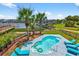 Inviting pool area with lounge chairs, lush landscaping, and picturesque waterfront views at 1510 North Shore Dr, Sunset Beach, NC 28468
