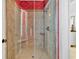 Beautiful tiled shower with glass enclosure and built-in bench at 1510 North Shore Dr, Sunset Beach, NC 28468