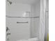 Clean bathroom with shower and tub combination and hand rail at 1605 S Ocean Blvd. # 208, Myrtle Beach, SC 29577
