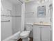 Bright white bathroom with shower and tub combination at 1605 S Ocean Blvd. # 208, Myrtle Beach, SC 29577