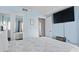 Bedroom features mirrored closets and flatscreen TV at 1605 S Ocean Blvd. # 208, Myrtle Beach, SC 29577