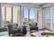 Bright living room view showcasing seating, a side table, a wooden coffee table, curtains, and ocean views at 1605 S Ocean Blvd. # 208, Myrtle Beach, SC 29577