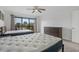 Bedroom with beds, ceiling fan, sliding glass door to balcony, and a dresser at 1809 Crooked Pine Dr. # G3, Surfside Beach, SC 29575