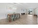 Open-concept dining area with stylish furnishings, tile floors, and lake views at 1809 Crooked Pine Dr. # G3, Surfside Beach, SC 29575