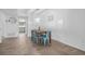 Bright and airy dining area with stylish furnishings, modern lighting, and tile floors at 1809 Crooked Pine Dr. # G3, Surfside Beach, SC 29575