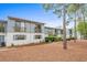 Two-story condo building with balconies, well-maintained landscaping and attractive shutters at 1809 Crooked Pine Dr. # G3, Surfside Beach, SC 29575