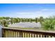 Beautiful lake view from the deck with a palm tree at 1809 Crooked Pine Dr. # G3, Surfside Beach, SC 29575