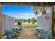Outdoor patio area offers seating and grill with a picturesque lake view at 1809 Crooked Pine Dr. # G3, Surfside Beach, SC 29575
