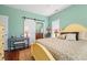 Relaxing bedroom with natural light, barn door entrance, and access to bathroom at 1907 Enclave Ln. # 1907, North Myrtle Beach, SC 29582
