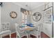 Bright dining room featuring a wooden table, chandelier, and elegant nautical decor at 1907 Enclave Ln. # 1907, North Myrtle Beach, SC 29582
