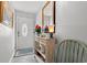 Welcoming foyer with decorative console table and floral accents at 1907 Enclave Ln. # 1907, North Myrtle Beach, SC 29582