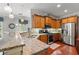 Gourmet kitchen with granite countertops, stainless steel appliances, and a breakfast bar at 1907 Enclave Ln. # 1907, North Myrtle Beach, SC 29582
