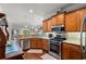 Modern kitchen boasts granite countertops, stainless steel appliances, and ample cabinet space at 1907 Enclave Ln. # 1907, North Myrtle Beach, SC 29582