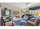 Comfortable living room with stylish furnishings and seamless flow into the cozy sun room at 1907 Enclave Ln. # 1907, North Myrtle Beach, SC 29582