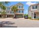 Attractive townhomes with garages, manicured landscaping, and convenient parking enhance the curb appeal at 1907 Enclave Ln. # 1907, North Myrtle Beach, SC 29582