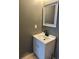 Bathroom sink and mirror with black faucet at 2005 Greens Blvd. # D301, Myrtle Beach, SC 29577