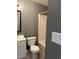 This bathroom is equipped with a toilet, vanity, and shower at 2005 Greens Blvd. # D301, Myrtle Beach, SC 29577