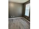 This cozy bedroom has updated flooring and a bright window providing natural light at 2005 Greens Blvd. # D301, Myrtle Beach, SC 29577