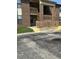 Close up view of brick apartment building with wooden porch and stairs at 2005 Greens Blvd. # D301, Myrtle Beach, SC 29577