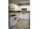 Kitchen featuring stainless steel appliances, updated marble countertops and a sink at 2005 Greens Blvd. # D301, Myrtle Beach, SC 29577