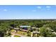 Aerial view of the house with mature trees and landscaping at 207 Green Lake Dr., Myrtle Beach, SC 29572