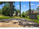 Large backyard with a metal storage shed and partial fencing providing privacy and security at 207 Green Lake Dr., Myrtle Beach, SC 29572