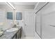 Functional bathroom with a shower, single vanity, and classic white tile at 207 Green Lake Dr., Myrtle Beach, SC 29572