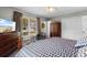 Comfortable bedroom with a dresser, ceiling fan, and soft natural lighting at 207 Green Lake Dr., Myrtle Beach, SC 29572