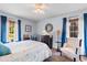 Inviting bedroom with plush carpet, large windows, elegant furniture, and stylish decor at 207 Green Lake Dr., Myrtle Beach, SC 29572