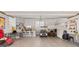 Spacious garage with epoxy floors, ample storage, and room for multiple cars and a golf cart at 207 Green Lake Dr., Myrtle Beach, SC 29572