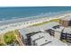 Aerial view of condo complex, showcasing beach access and proximity to the ocean at 208 N Ocean Blvd. # 226, North Myrtle Beach, SC 29582