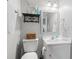 Well-lit bathroom with updated fixtures, a vanity, and a decorative shelf at 208 N Ocean Blvd. # 226, North Myrtle Beach, SC 29582