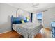 Comfortable bedroom with hardwood floors, a ceiling fan, and balcony access at 208 N Ocean Blvd. # 226, North Myrtle Beach, SC 29582