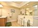 Bathroom with a soaking tub, large mirror, neutral tile, and vanity with sink at 2180 Waterview Dr. # 1013, North Myrtle Beach, SC 29582