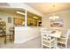 Inviting dining area featuring a decorative chandelier and open views to the kitchen at 2180 Waterview Dr. # 1013, North Myrtle Beach, SC 29582