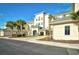 Inviting exterior of a multi-story building with lush landscaping and a welcoming entrance at 2180 Waterview Dr. # 1013, North Myrtle Beach, SC 29582