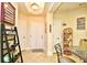 Entrance foyer featuring a decorated accent wall and tile flooring at 2180 Waterview Dr. # 1013, North Myrtle Beach, SC 29582