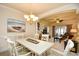 Open-concept living and dining area, filled with natural light and stylish decor at 2180 Waterview Dr. # 1013, North Myrtle Beach, SC 29582
