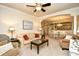 Open-concept living room and dining area, with archway to the kitchen, perfect for entertaining at 2180 Waterview Dr. # 1013, North Myrtle Beach, SC 29582