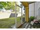 Inviting screened porch offering a view of the spacious, well-maintained backyard and garden at 2180 Waterview Dr. # 1013, North Myrtle Beach, SC 29582