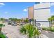 Exterior view from above, showing a well maintained parking lot and some green spaces at 2311 S Ocean Blvd. # 341, Myrtle Beach, SC 29577