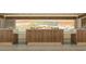 Modern lobby features a stylish reception desk, beach decor, and a welcoming atmosphere at 235 Fins Up Circle # 1-102, Myrtle Beach, SC 29572